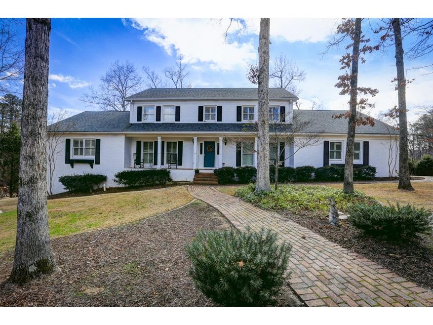 Front of home- level 1+ acre lot