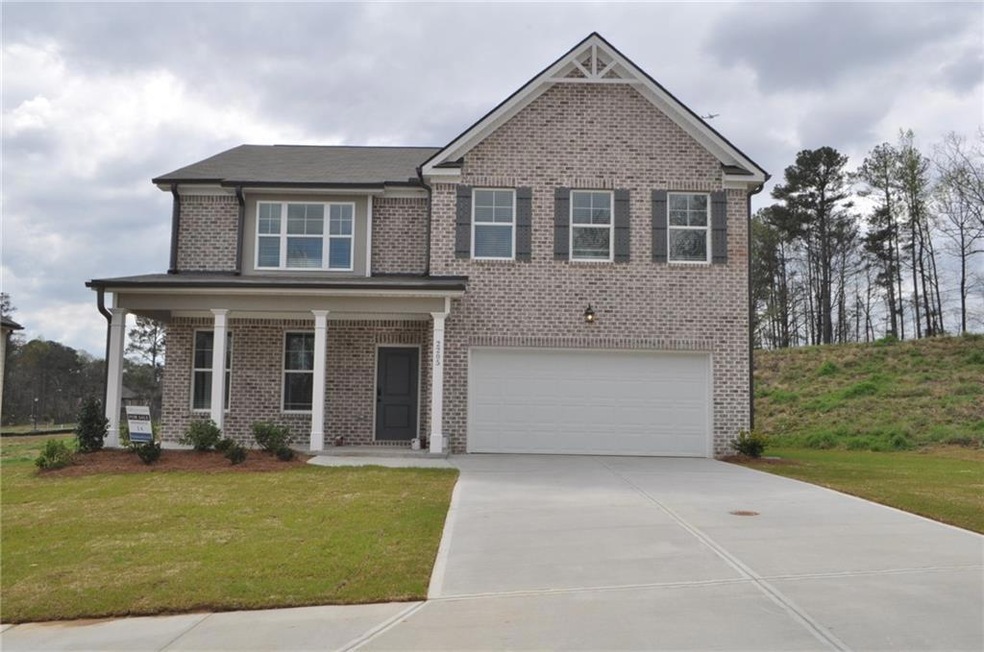 View of front of property featuring a front lawn a
