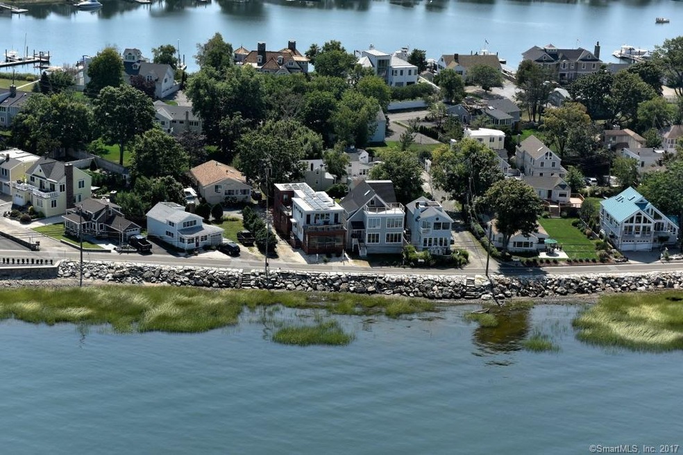 68 Harbor Road is the 4th house from the right in 