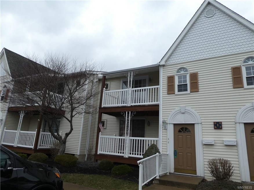 upper unit with covered balcony