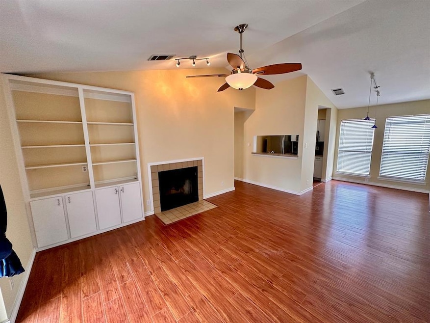 Unfurnished living room with a ceiling fan, lofte