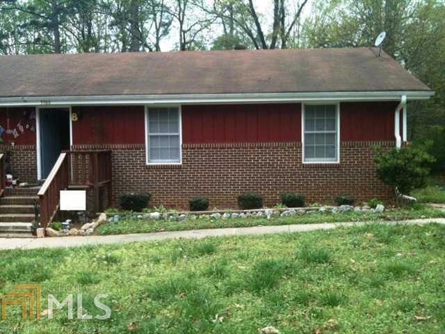 5566 Rock Garden Ct NW unit B, Lilburn, GA 30047 - photo 1