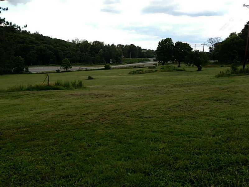 Land. Slightly sloping 7.8 acres - former farmette