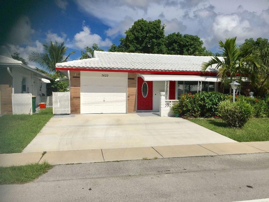 Front of Home with Extra Wide Cement Driveway and