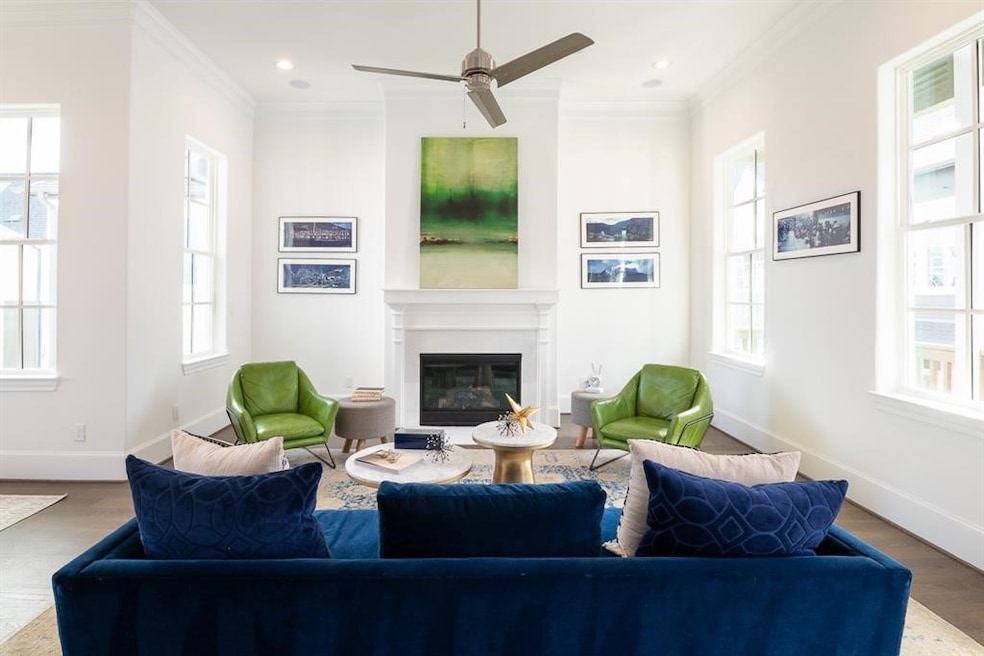 Living room with fireplace and lots of windows! 
