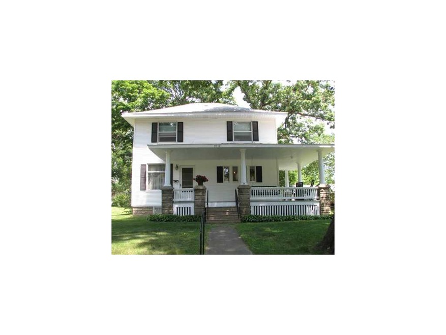 Front Exterior. Charming home with large covered p