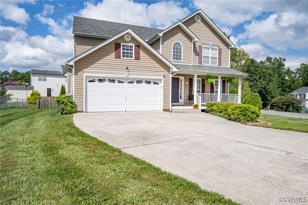 View of front of home featuring a garage, a front