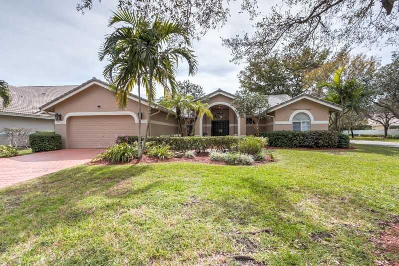 Exterior Front. Large corner lot of quite tree lin