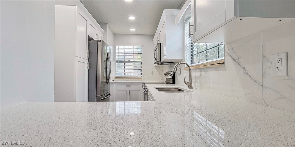 5367 Treetops Dr unit 101, Naples, FL 34113 - photo 1