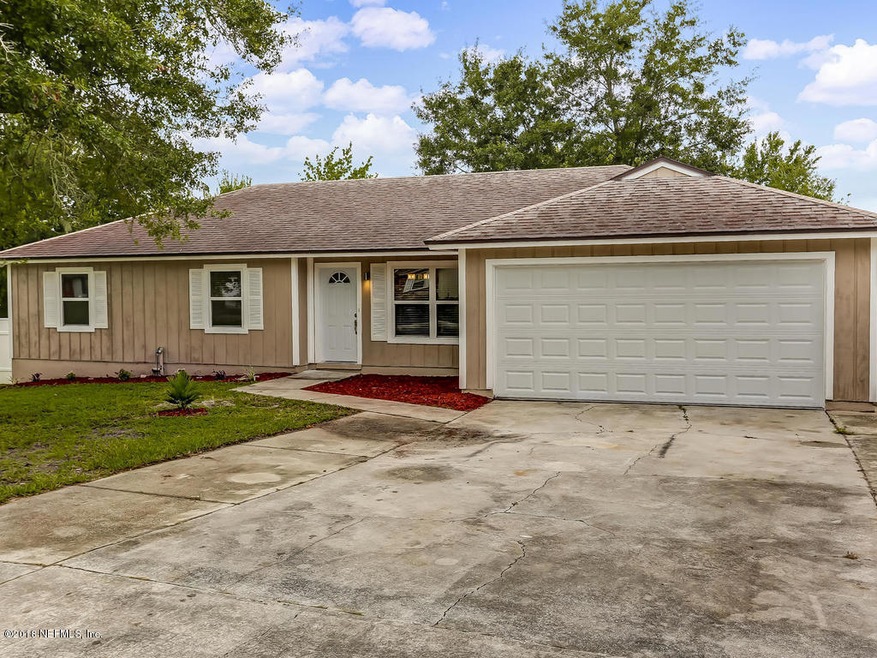 8981 Winrock Dr N, Jacksonville, FL 32216 - photo 1