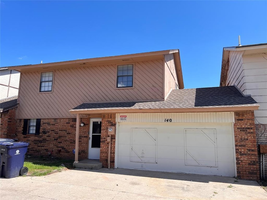 View of front of home & driveway