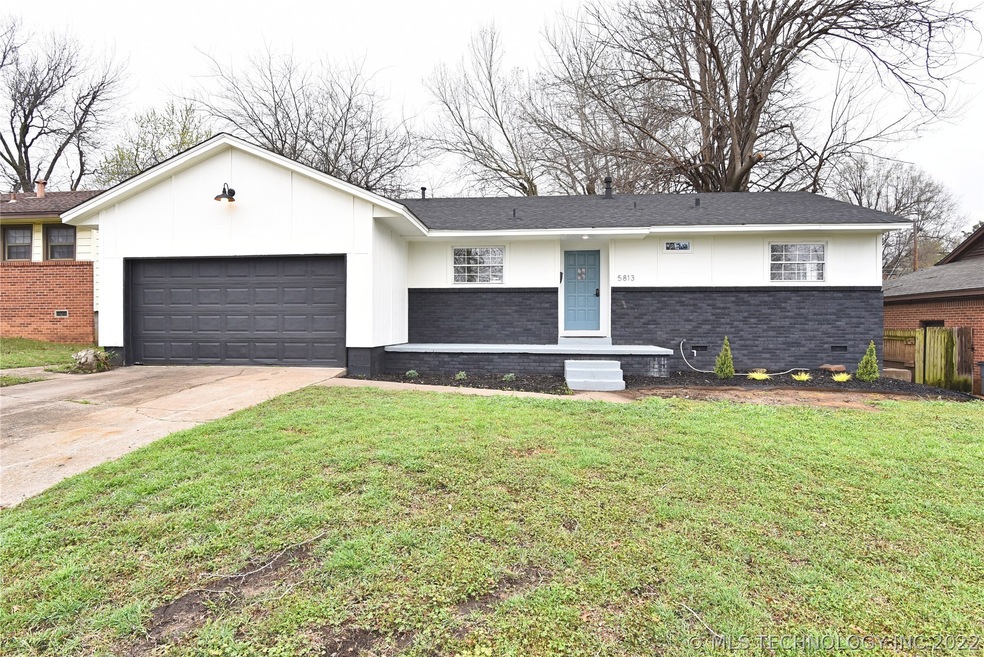 Great curb appeal!  The new roof's slate-colored s
