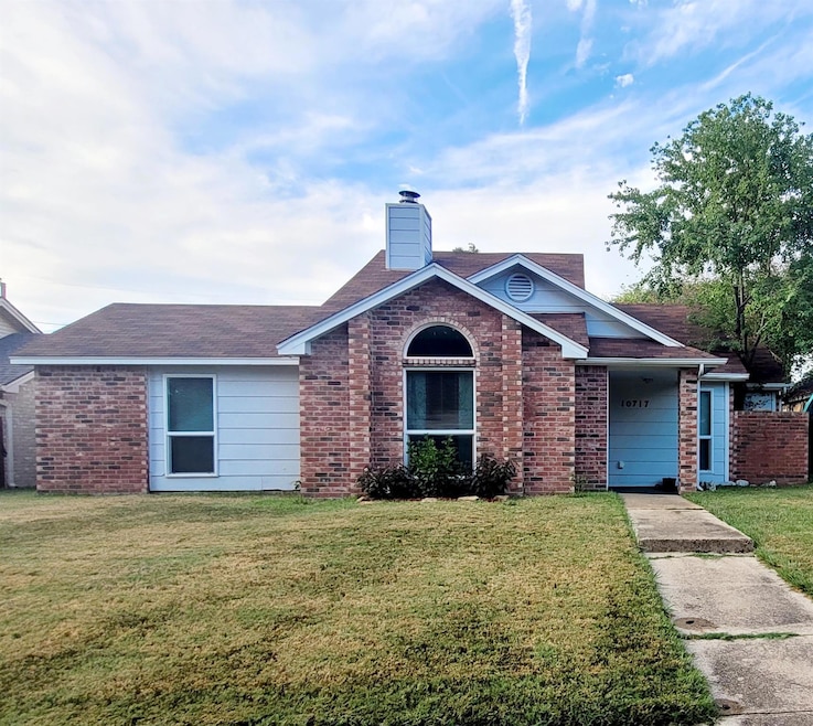 Single story home with a front lawn