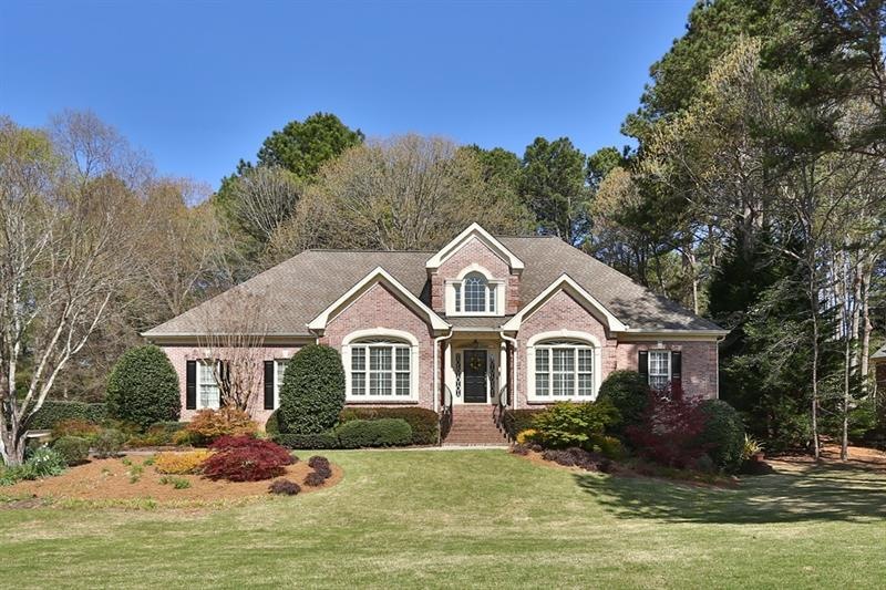 Four sided brick home on amazing level lot! Landsc