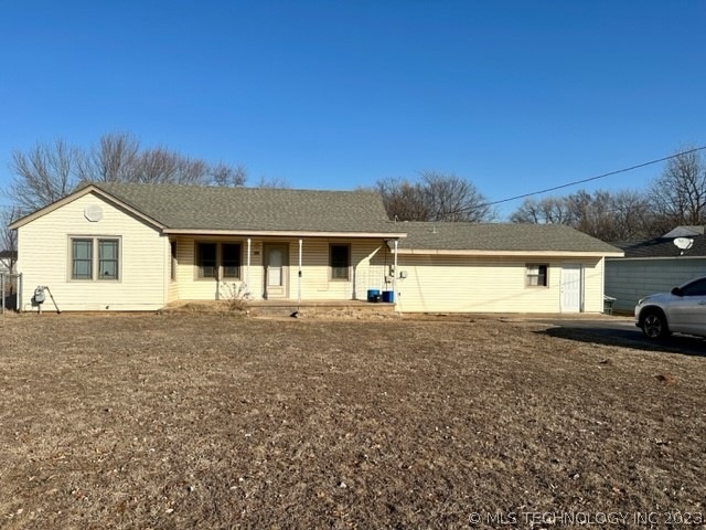 Relax on covered front porch of 3/2/1 home with 2