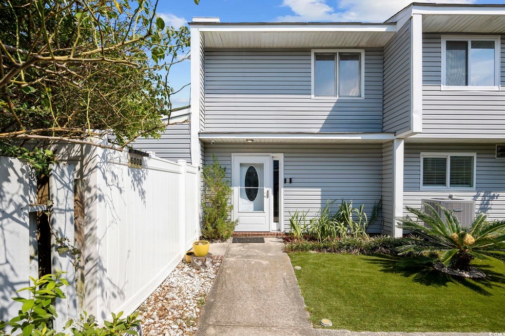 View of front of property with a front yard