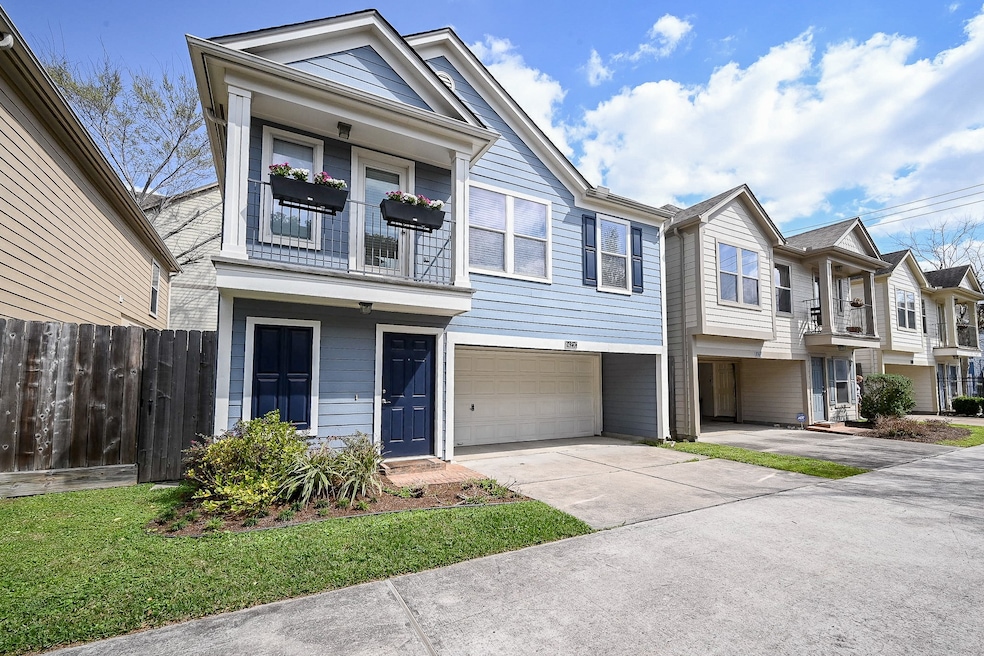 Charming two-story townhouse , featuring a balcony