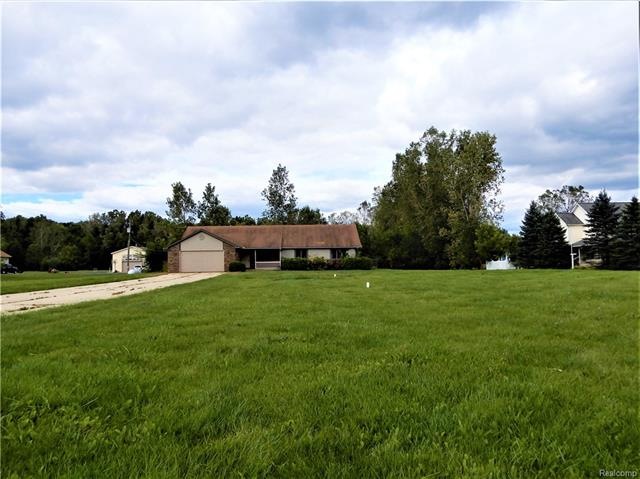 CUSTOM BUILT ON ALMOST 3 ACRES OF LAND (2.69)OVER 