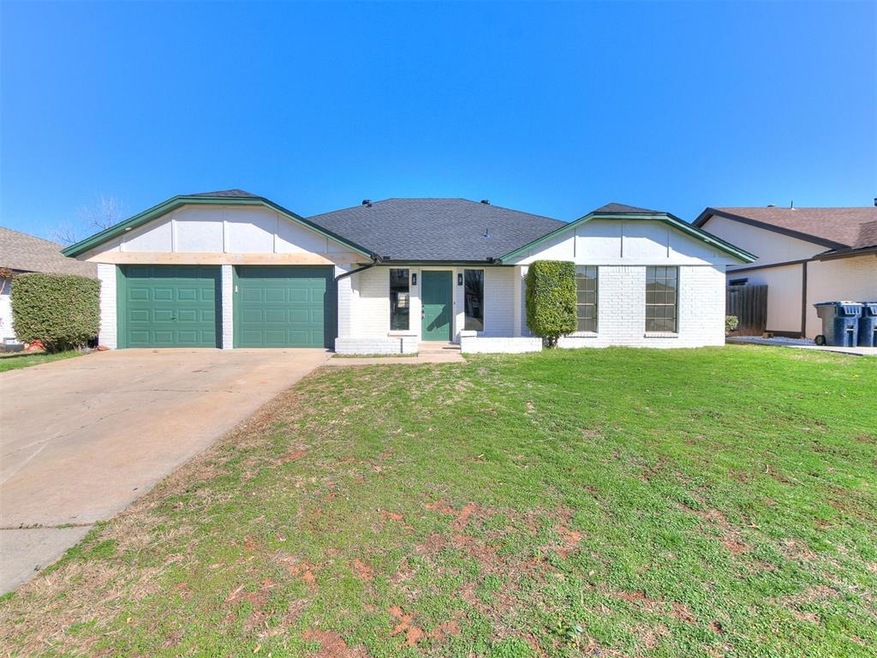 View of front of home featuring brick siding, an a