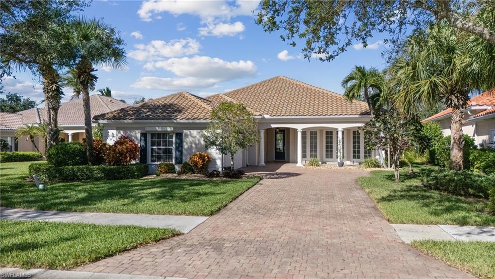 Mediterranean / spanish house featuring covered po