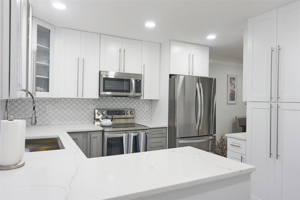 6095 N Sabal Palm Blvd unit 305, Tamarac, FL 33319 - photo 1