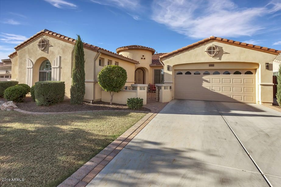 Front of home with front courtyard