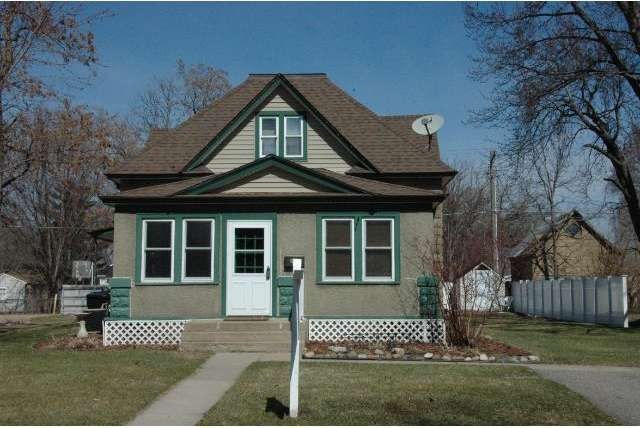 This classic 1 1/2 story home has many upgrades an