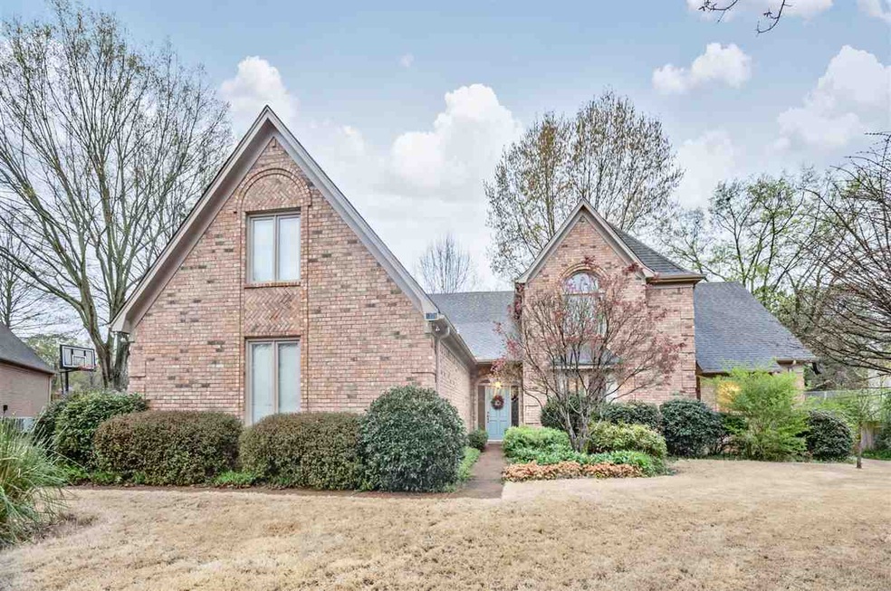 This lovely all brick home is located on almost 2/