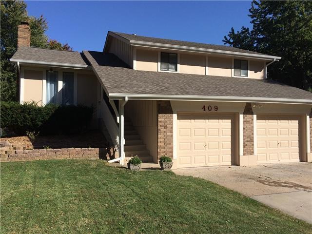 409 N Madison St, Raymore, MO 64083 - photo 1