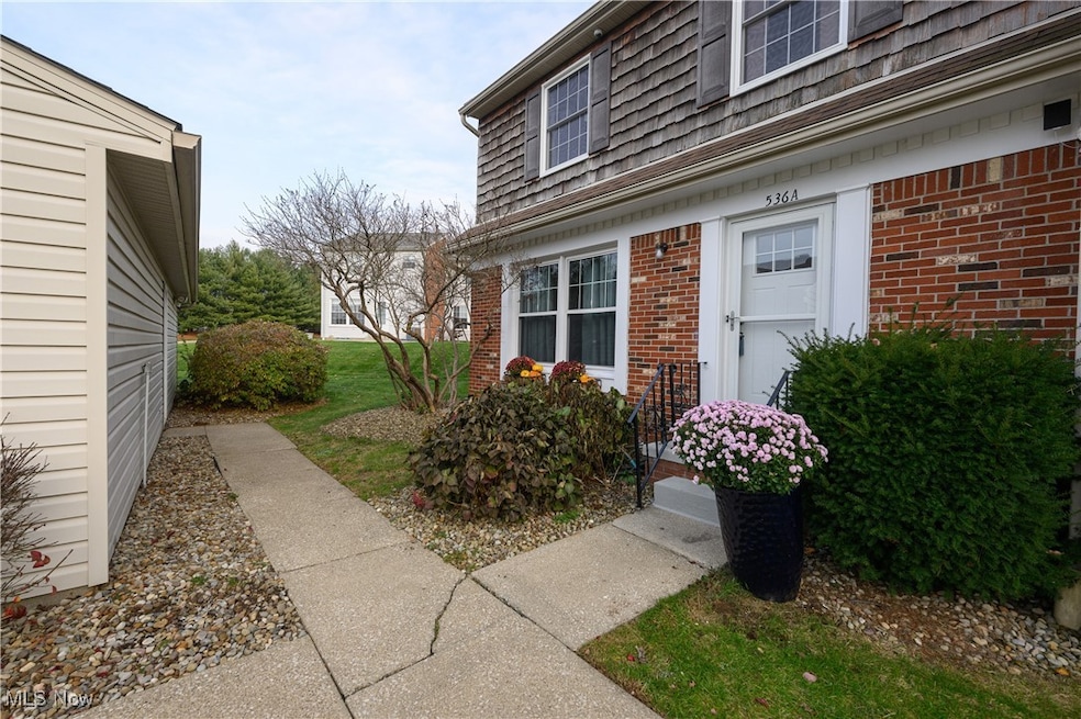 Property entrance with brick siding