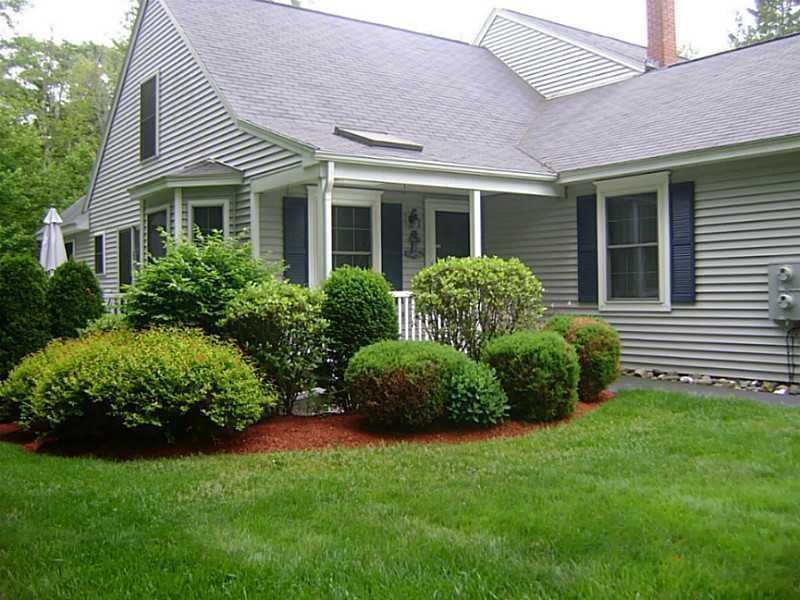 Exterior Front. Lushly landscaped...