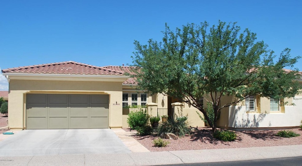 Front of home w/ private court yard