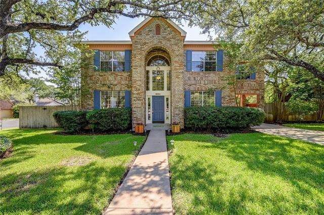 Immaculate corner lot layered in luscious grass.