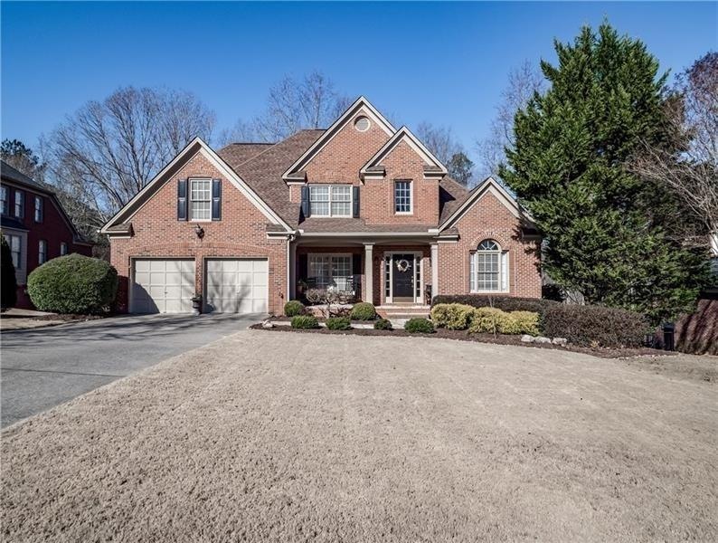 3 sides brick, move in ready on 3/4 acre low maint