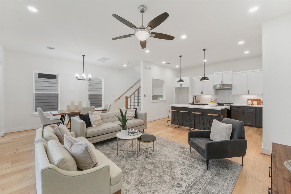 Modern open-plan living space featuring a combined