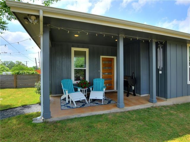 Front of house with beautiful original siding. Lar