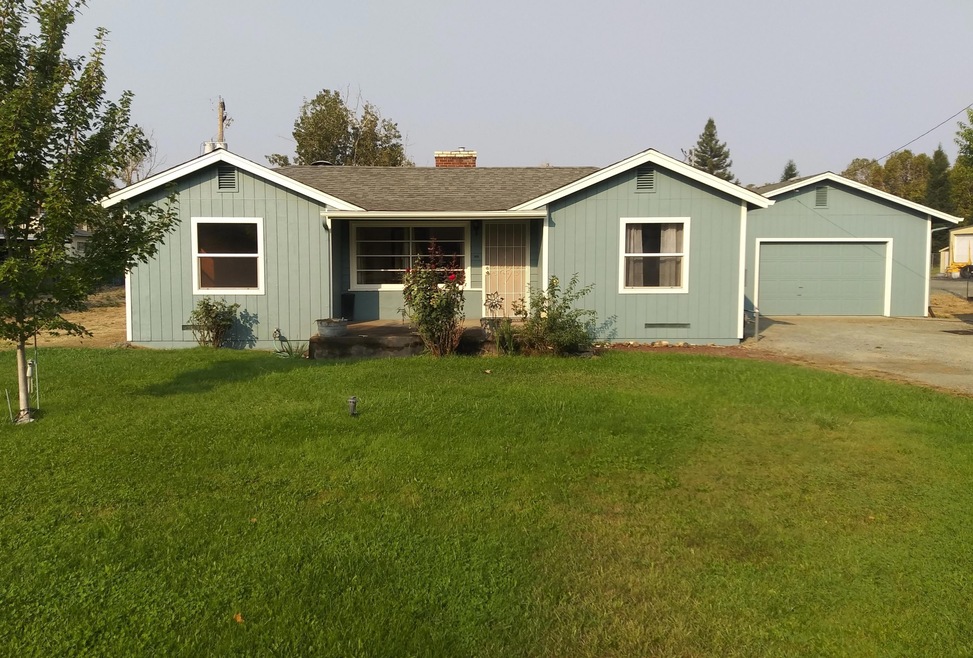 Front view, quiet neighborhood