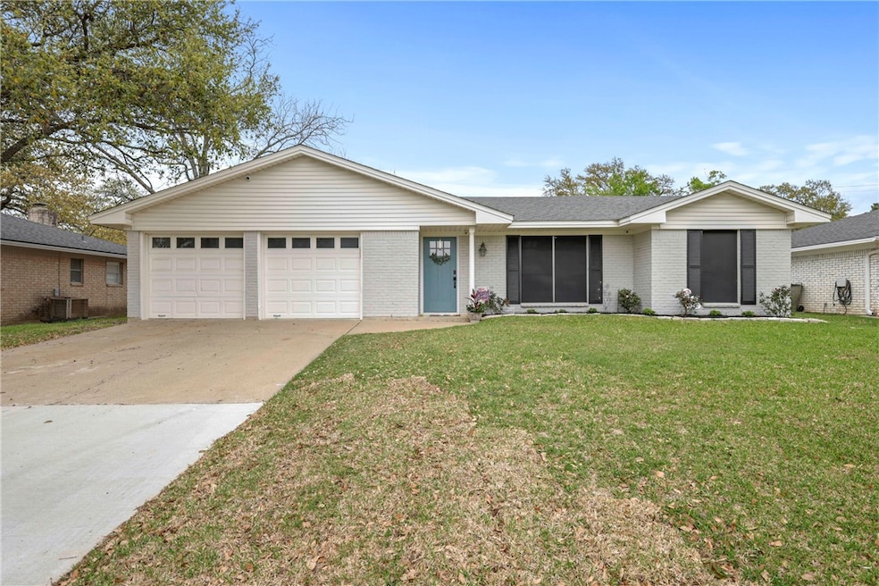 Single story home featuring an attached garage, co