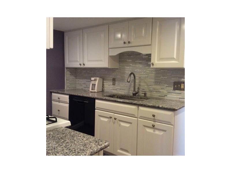 Kitchen. New kitchen cabinets, granite, and glass