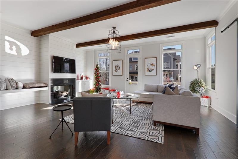 Very spacious and elegant living area with hardwoo