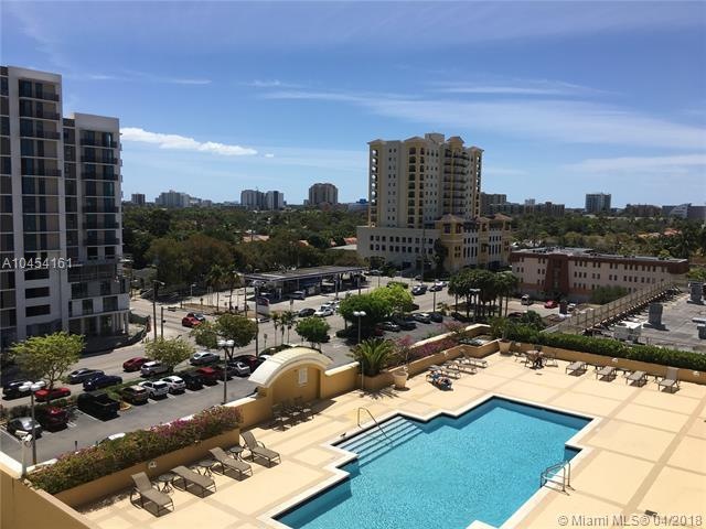 Beautiful  ample view of the pool area and skyline
