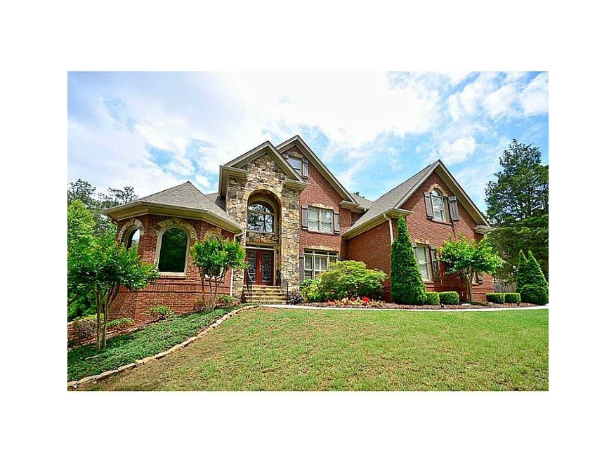 Exterior Front. Elegant brick & stone Master-on-Ma