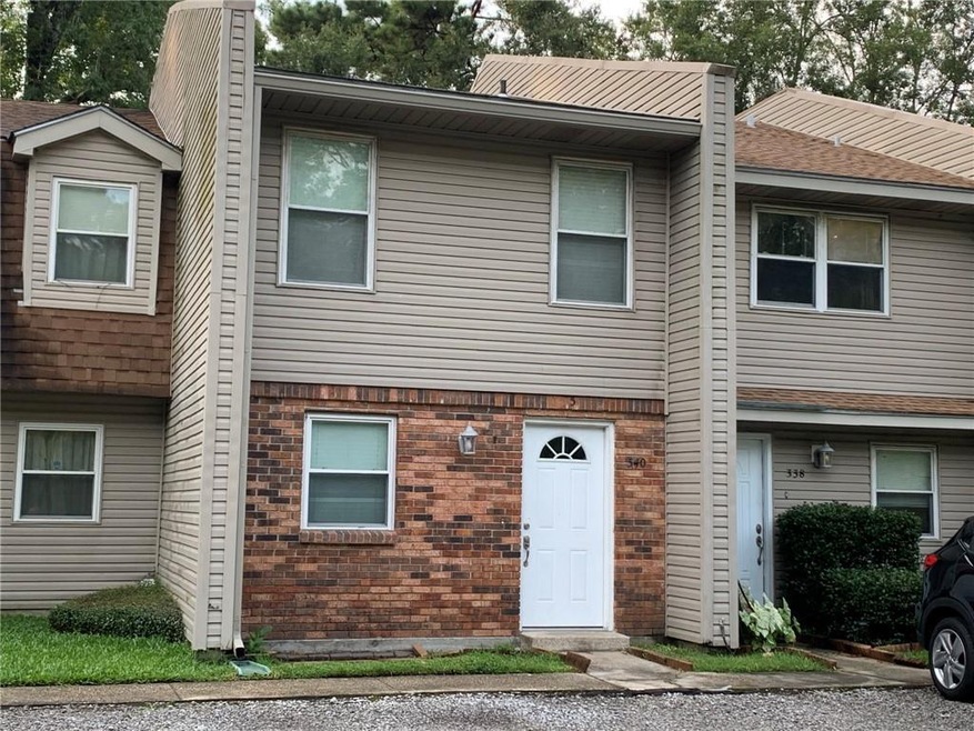 Middle unit in this photo is the one for sale.