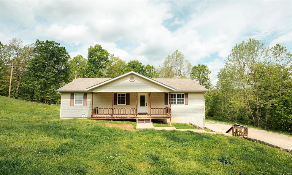 13610 Tassel Ln, Devils Elbow, MO 65457 - photo 1