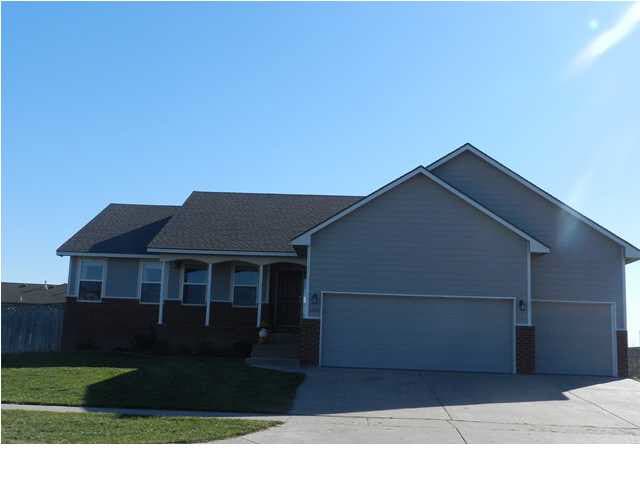 Front View of the Home with a 3 Car Garage and Sid