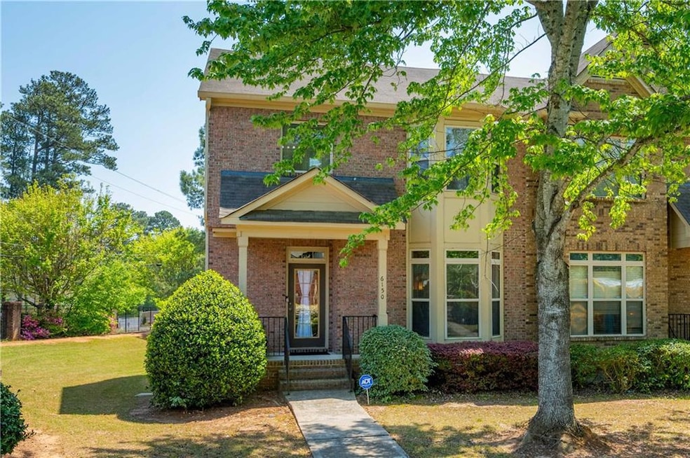 Front of home. End unit with 3 bedrooms, 2 full an