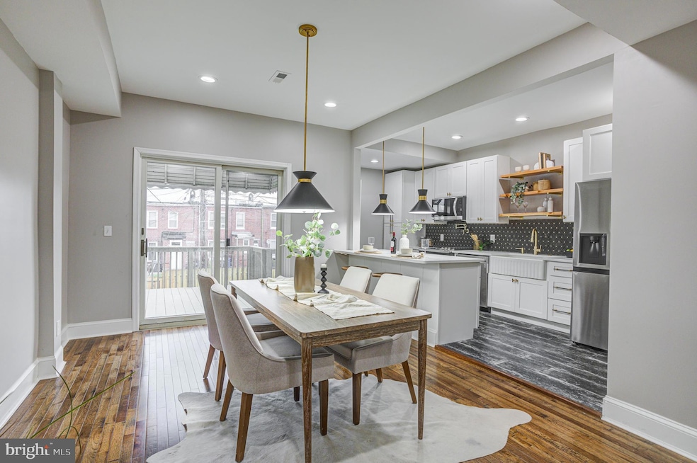 1704 E 32nd St, Baltimore, MD 21218 - photo 1