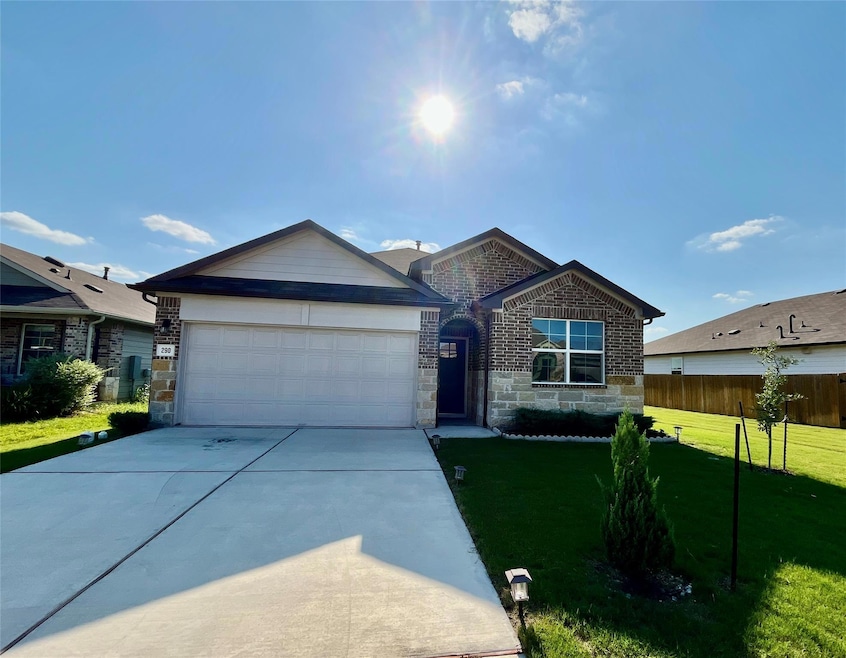 View of front of house featuring stone siding, co