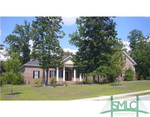 Exterior Front. Gorgeous brick executive home with