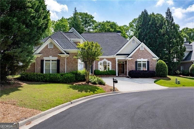View of front of property with a front lawn